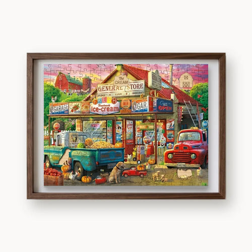 Country General Store, a rectangular whimsy-cut wooden puzzle shown framed as wall art