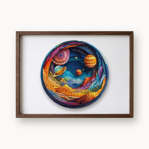 Cosmic Voyage, a round whimsy-cut wooden puzzle shown framed as wall art
